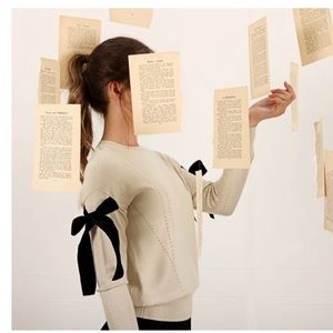 Sweater, with velvet black bows on side